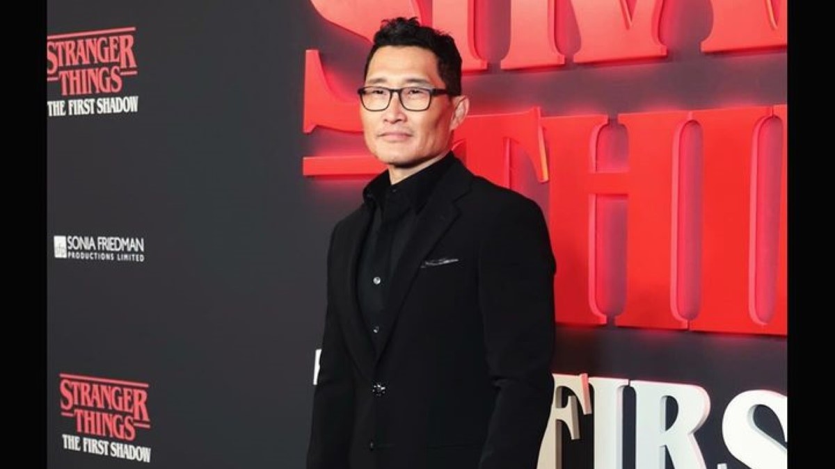 Daniel Kim in Black coat